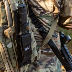 SOG SEAL Pup Elite Black, Serrated - Ballistic Nylon Sheath -Outdoor Sports Equipment Store E37TN CP story main 2